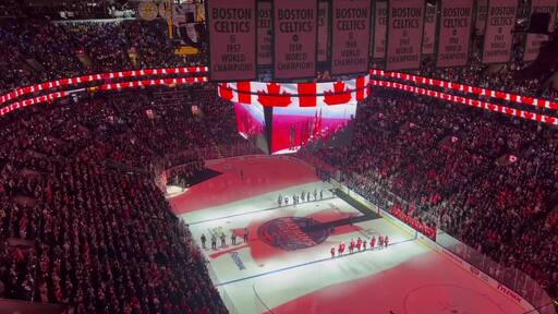 American fans lightly boo `O Canada' before 4 Nations Face-Off title game, singer changes lyrics